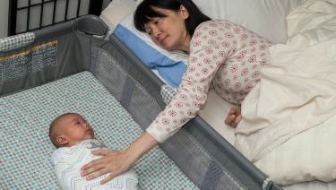 getting newborn to sleep in bassinet at night