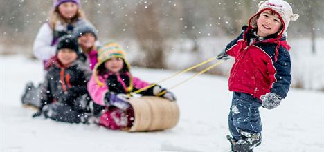 https://www.healthychildren.org/SiteCollectionImagesArticleImages/child-pulling-sled-snow-for-article.jpg?RenditionID=3