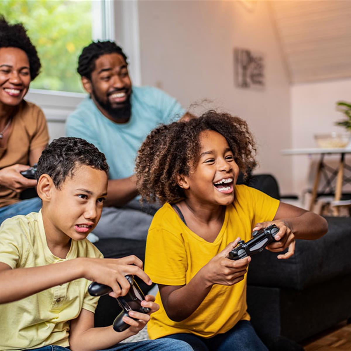 Family Playing Video Games Together At Home2 ?RenditionID=6