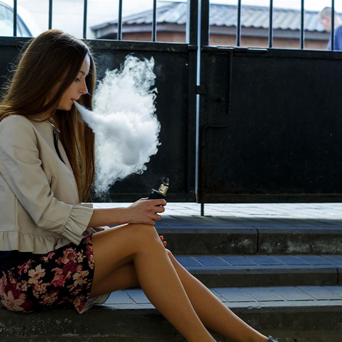 high school girls smoking cigarettes